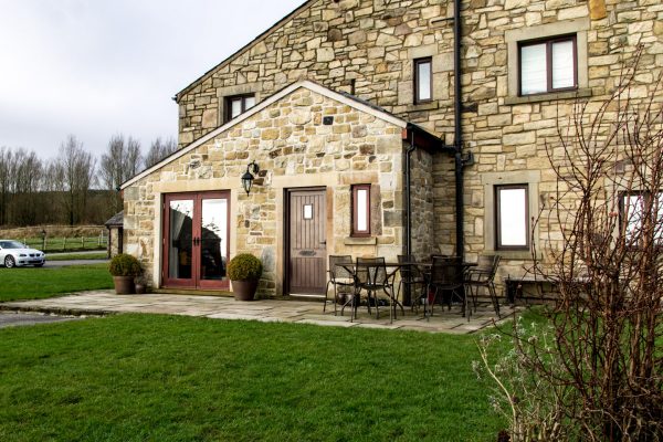 Single storey random stone house extension, Manchester